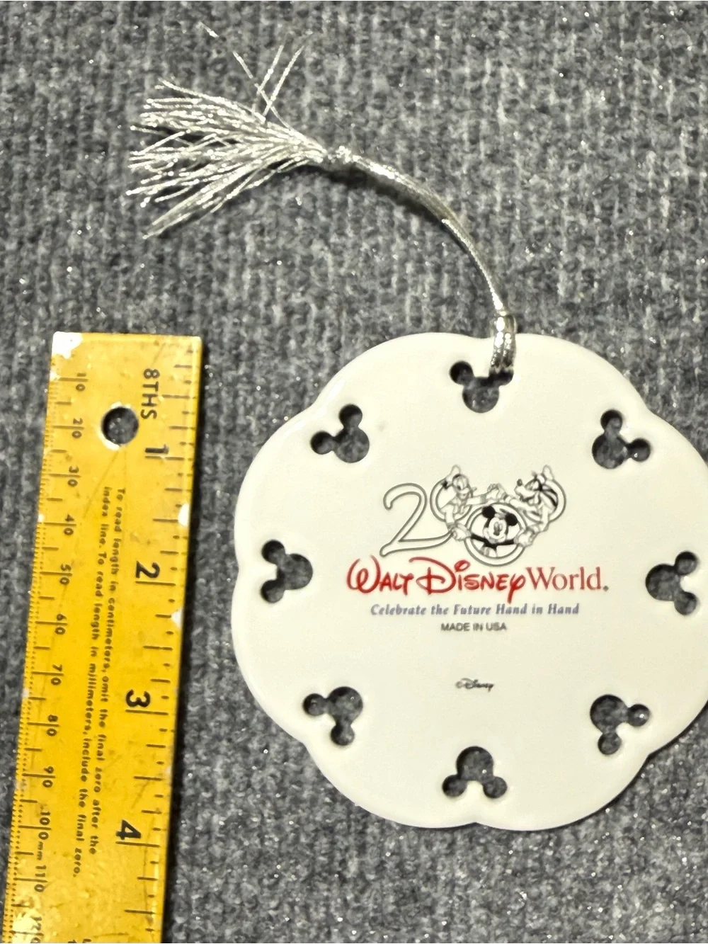 Walt Disney World EPCOT 2000 “Celebrate the Future Hand in Hand” ceramic ornamen
